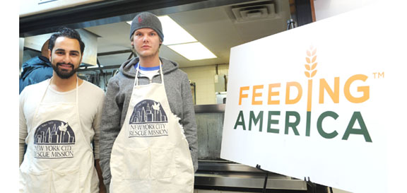NEW YORK, NY - JANUARY 23:  Avicii and Ash Pournouri support Feeding America by volunteering at the New York City Rescue Mission during the House For Hunger Tour New York City Rescue Mission on January 23, 2012 in New York City.  (Photo by Craig Barritt/Getty Images for EJ Media Group)